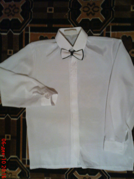 Продам: белая рубашка на мальчика(рост 128)
