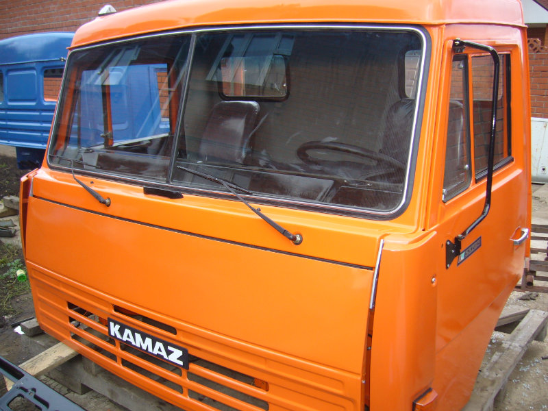 Куплю кабину камаза б у. Кабина КАМАЗ 53215. Кабина КАМАЗ 53205. Крыша кабины КАМАЗ 65115. КАМАЗ 65115 синяя кабина оранжевый кузов.