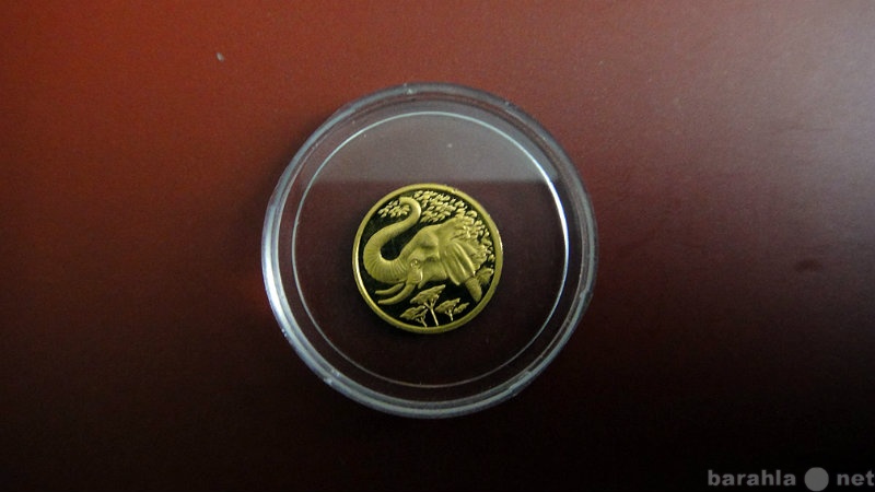 Продам: Редкая золотая монетка Сомали со слоном
