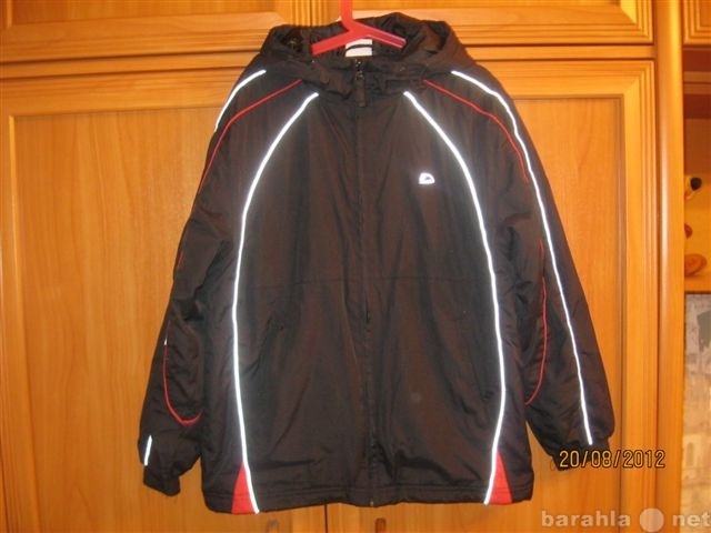 Продам: Куртка на мальчика 140-146 см.