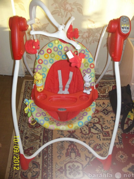 Продам: детскую электрическую качелю graco