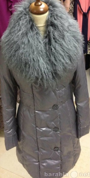 Продам: Пуховое пальто с мехом козлика 2 размера