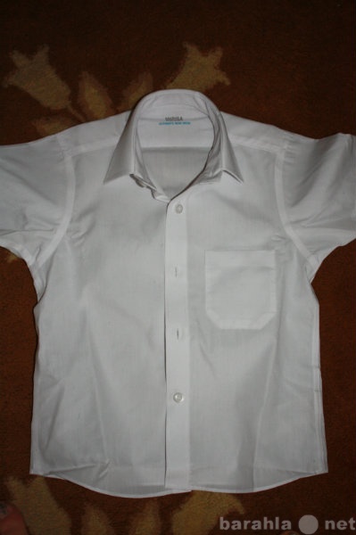 Продам: Новая белая рубашка рост 152