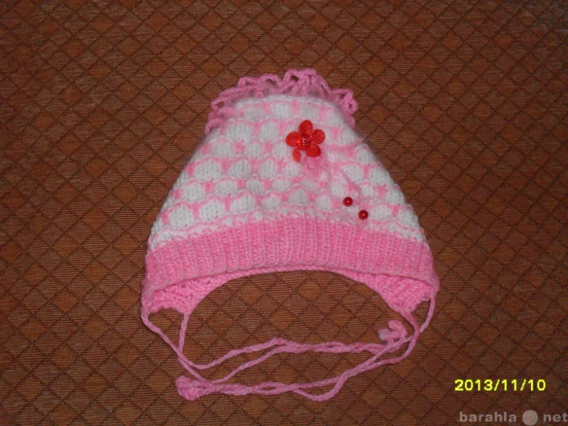 Продам: Зимняя вязаная шапочка для девочки