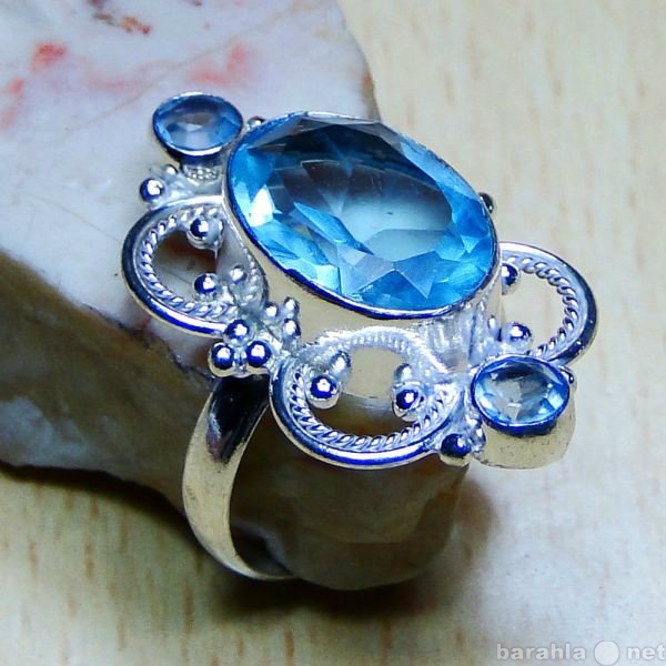 Продам: новое серебряное кольцо с топазом