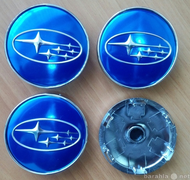 Продам: Заглушки в литые диски Subaru