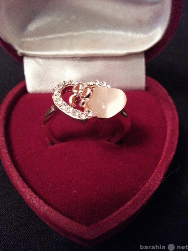 Продам: кольцо " Связанные сердца "