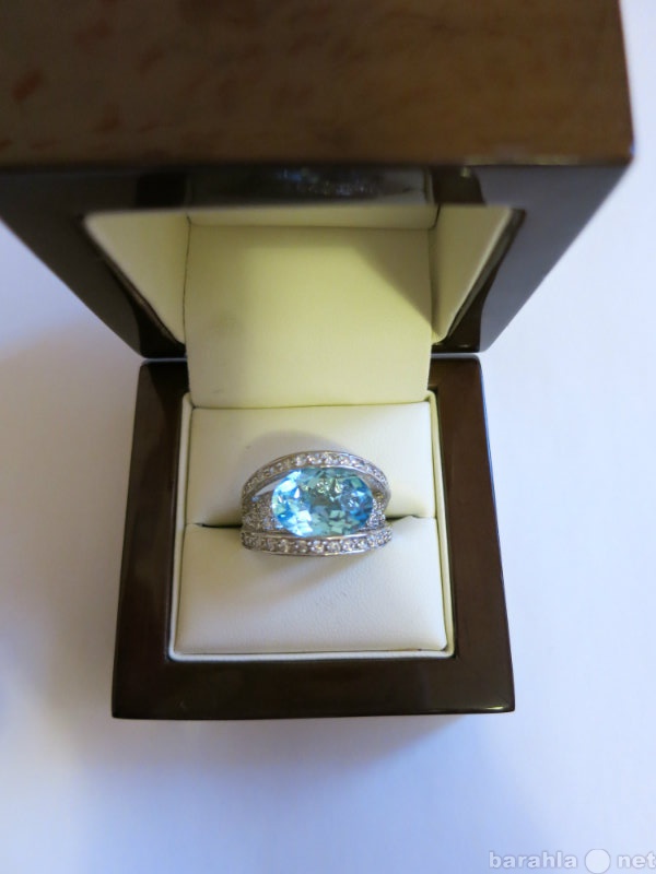 Продам: серебряное кольцо с топазом