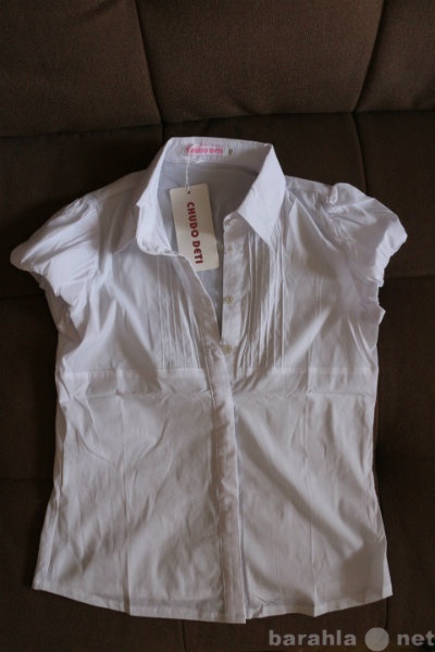 Продам: Белая рубашка новая девочке рост 152