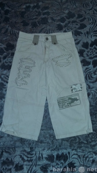 Продам: Бриджи и джинсы на мальчика (140-146 см)