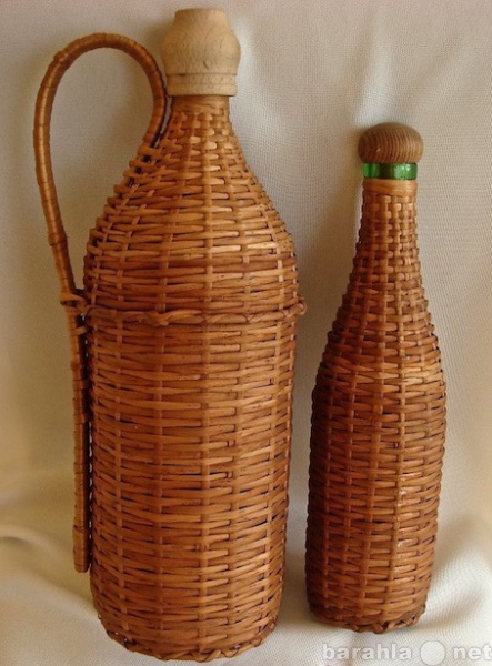 Продам: Бутылки в плетеной корзине