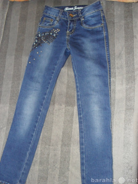 Продам: джинсы узкие на  девочку 116-122см