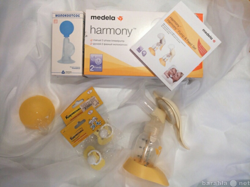 Продам: Молокоотсос и накладки Medela