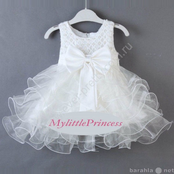 Продам: Детское платье белое с бусинами